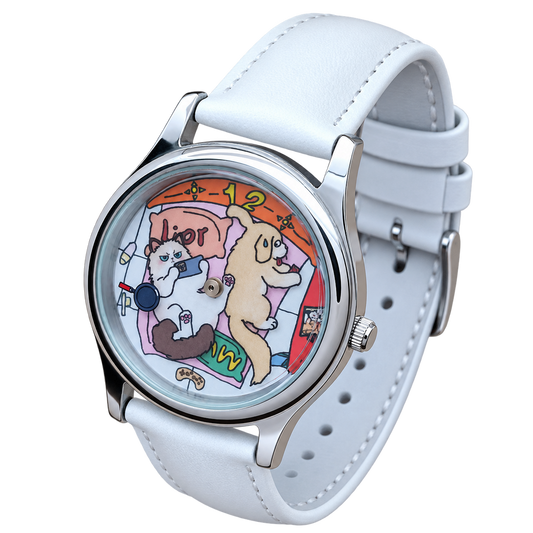 Angled view of CHOOSZ Cozy Co-op watch showing colorful cartoon animal dial, polished silver case and stitched white leather strap