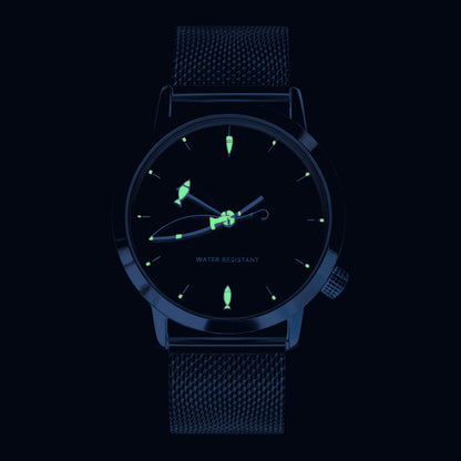 CHOOSZ Lucky Cast watch in the dark, showing green luminous details on fishing-themed hands and hour markers