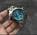 Morph Drift blue dial sculpted metal watch held outdoors