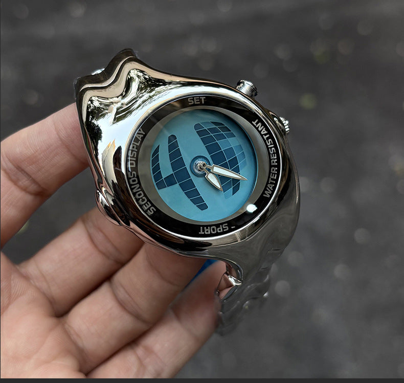 Morph Drift blue dial sculpted metal watch held outdoors
