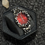 Abyssal Vine red dial gothic sculpted metal watch presented in box