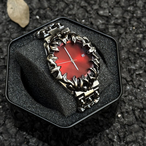 Abyssal Vine red dial gothic sculpted metal watch presented in box