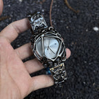 Void Lattice silver dial cyberpunk metal cage watch handheld close-up
