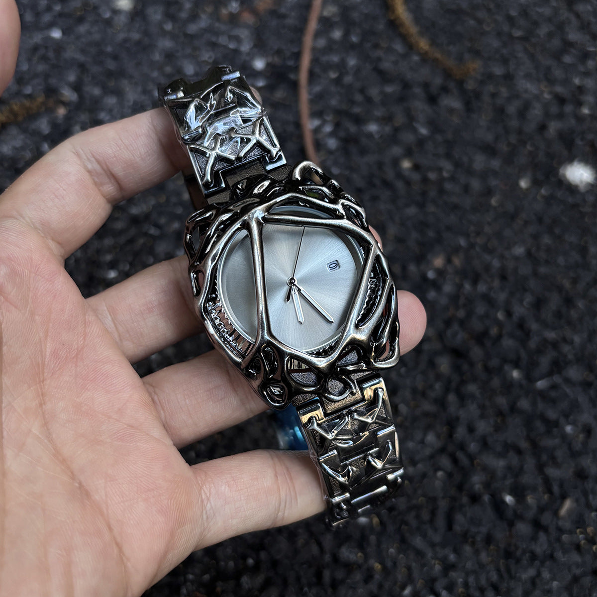 Void Lattice silver dial cyberpunk metal cage watch handheld close-up