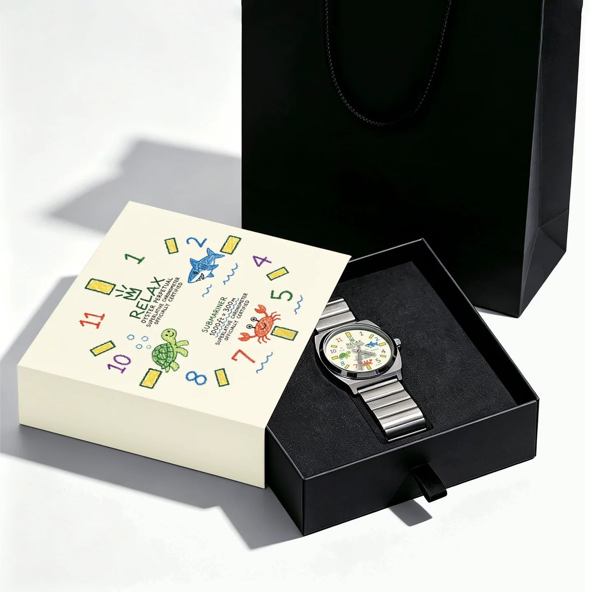 CHOOSZ Crown Doodle watch in an open black presentation box with matching sea-life illustrated sleeve and black gift bag