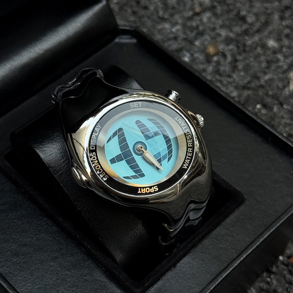 Morph Drift blue dial sculpted metal watch displayed in a black box