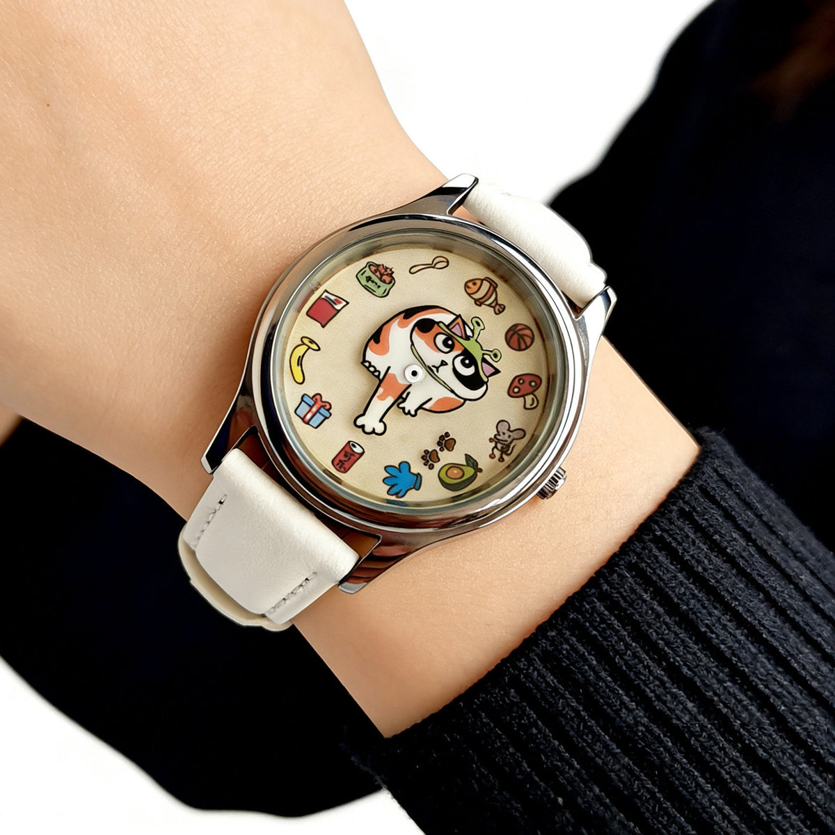 Meow's Wishlist Calico Cat watch with white leather strap worn on the wrist