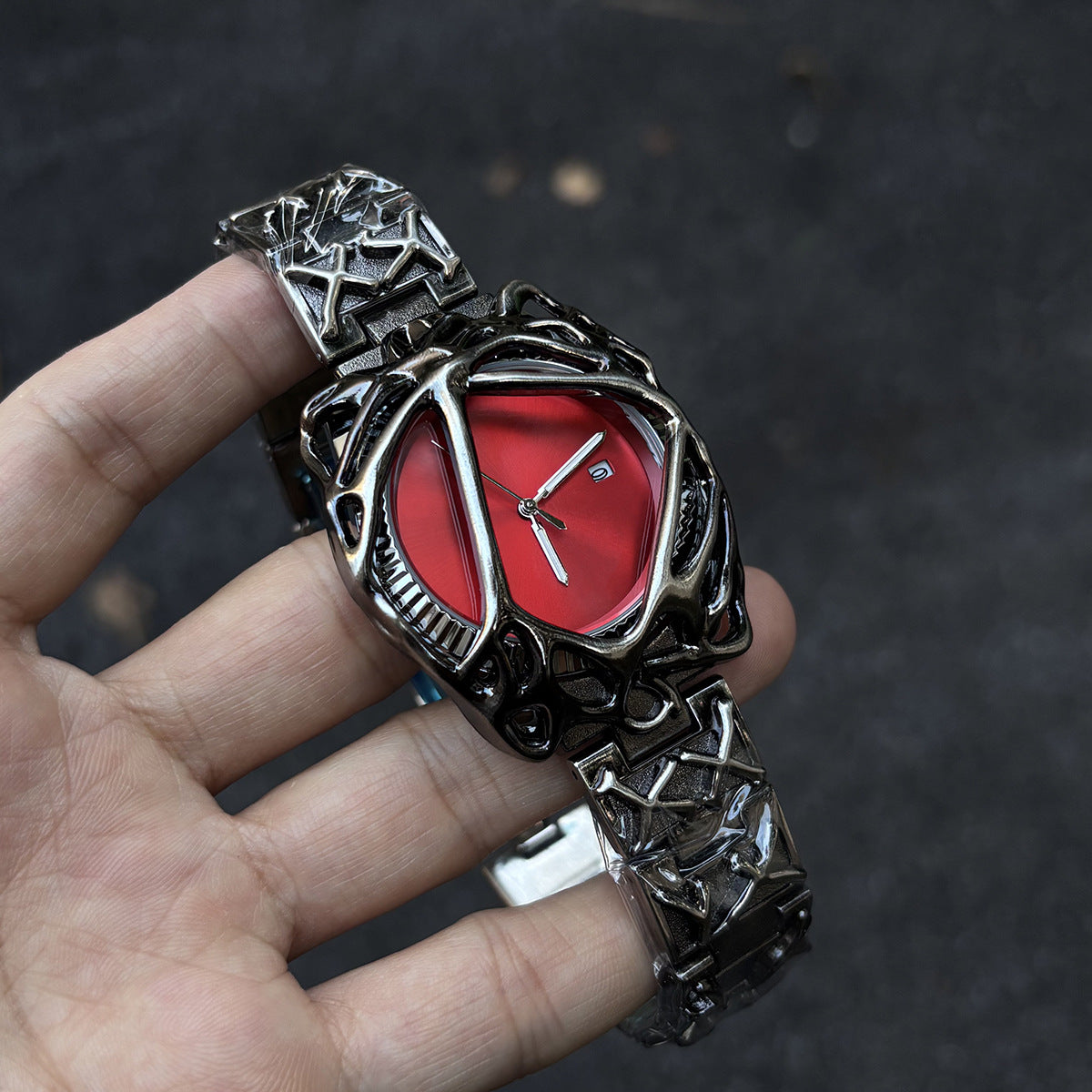 Void Lattice red dial cyberpunk metal cage watch handheld close-up