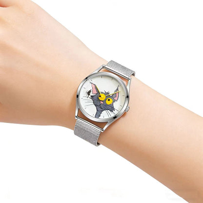 Chase Me, Kitty! white cat-and-mouse dial watch with silver mesh strap worn on a wrist against a white background