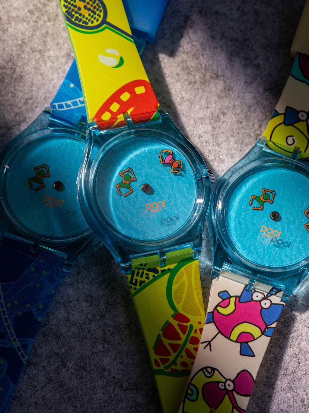 Pool Party watch collection with blue, neon sports and cartoon print straps
