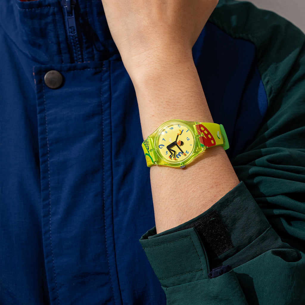 Time Thief translucent neon green watch styled with a blue and green outfit