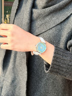Aqua Animism watch styled on the wrist with a casual outfit