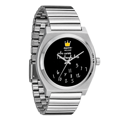 Angled view of CHOOSZ No Status watch with black crown-and-numeral dial and silver single-link steel bracelet