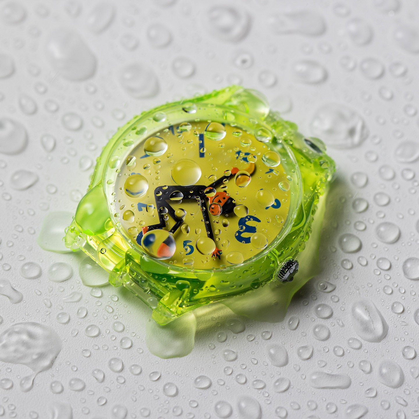 Time Thief translucent neon quartz watch with water droplets demonstrating daily water resistance