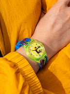 Time Thief neon green pop art watch styled with a yellow outfit