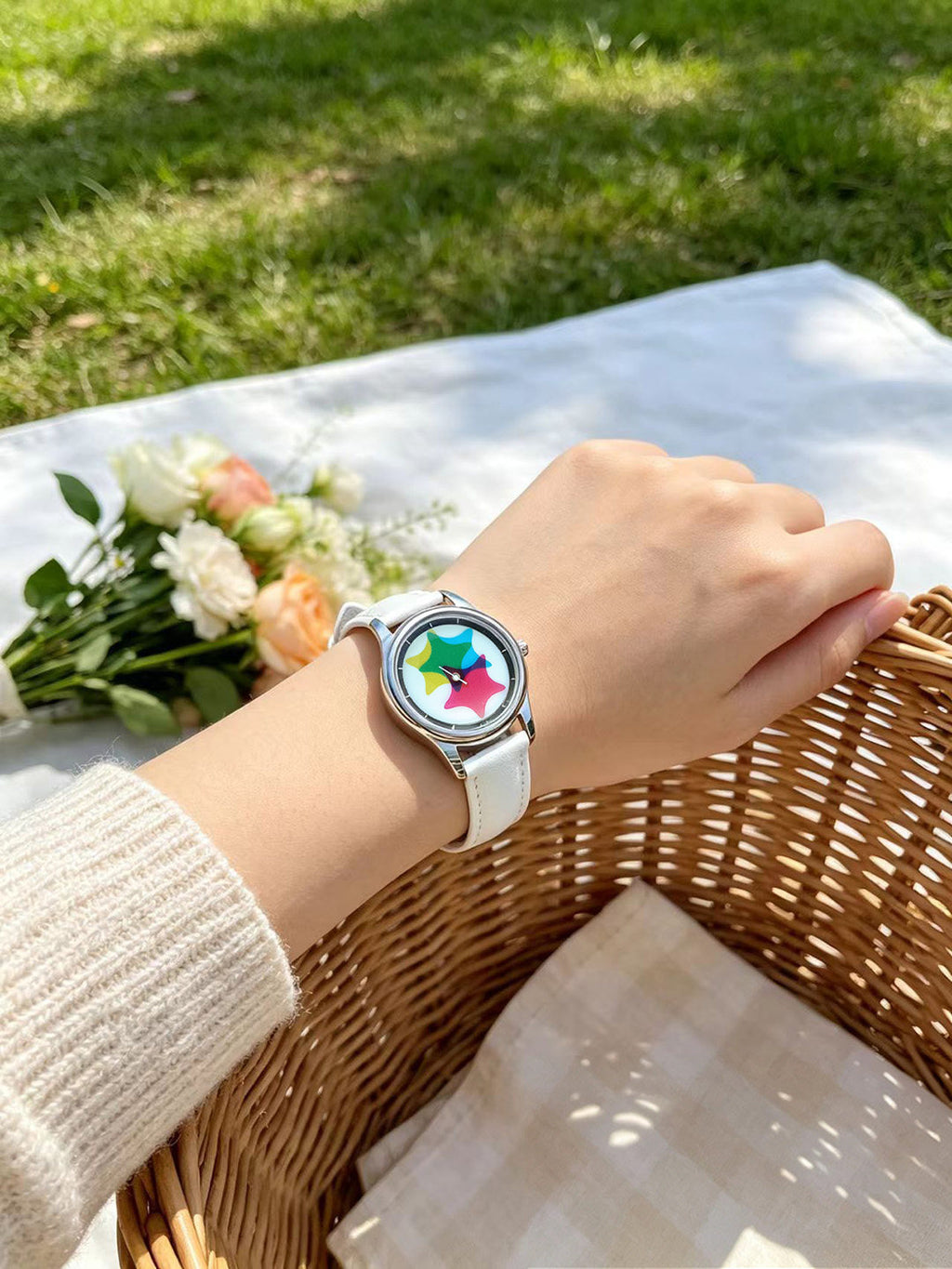 Chroma Morph CMY kaleidoscope watch worn on wrist outdoors