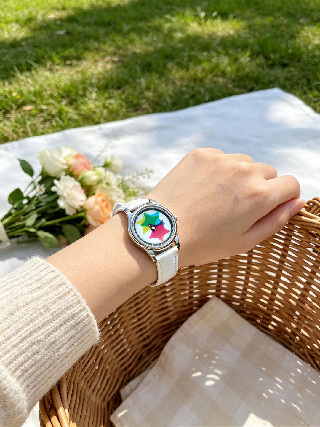 Chroma Morph CMY kaleidoscope watch worn on wrist outdoors