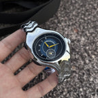 Chrono Flux yellow Y2K futuristic analog watch handheld close-up