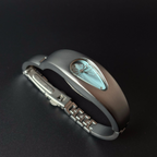 Mercury Drop blue dial Y2K futuristic waterdrop watch angled close-up