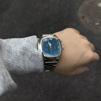 Pulse Matrix blue dial Y2K animated seconds watch worn on wrist