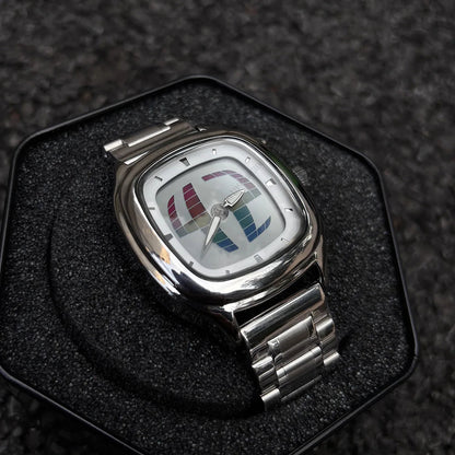 Pulse Matrix montre avec écran segmenté couleur arc-en-ciel et bracelet en acier inoxydable dans une boîte de présentation en mousse noire