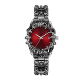 Abyssal Vine watch with red dial, date window, sculpted silver-tone claw frame and matching metal bracelet, front view