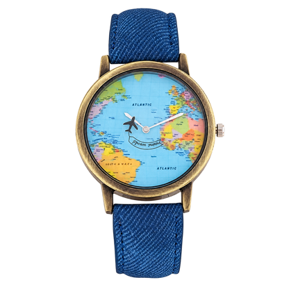 CHOOSZ Wander Orbit watch with blue world-map dial, airplane-shaped seconds hand, antique gold-tone case and blue textured strap