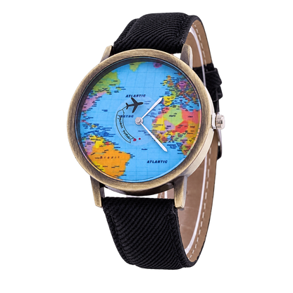 Angled view of CHOOSZ Wander Orbit watch with blue world-map dial, airplane-shaped seconds hand and black textured strap