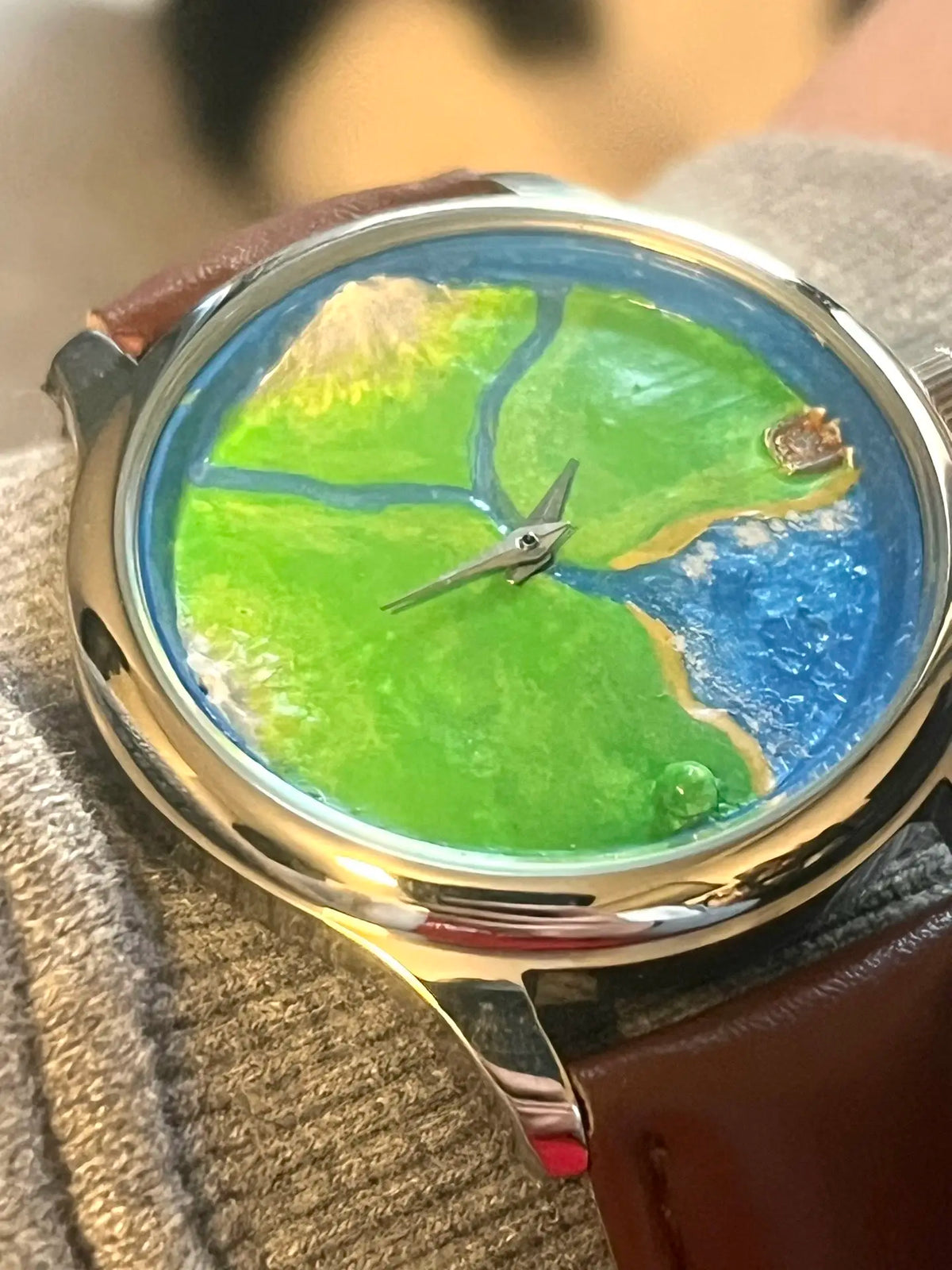 Discarded hand-painted landscape dial from the Nature's Orbit development process