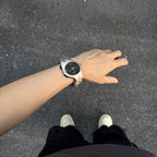 Chrome Ripple silver Y2K statement watch worn on wrist