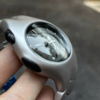 Chrome Ripple silver wavy metal watch dial detail