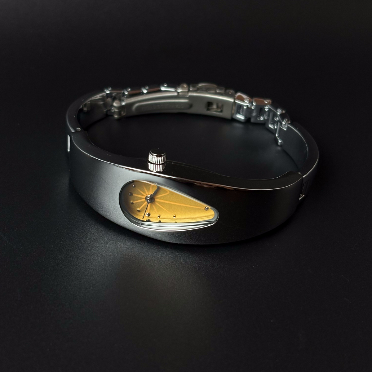 Mercury Drop yellow dial Y2K futuristic waterdrop watch angled view