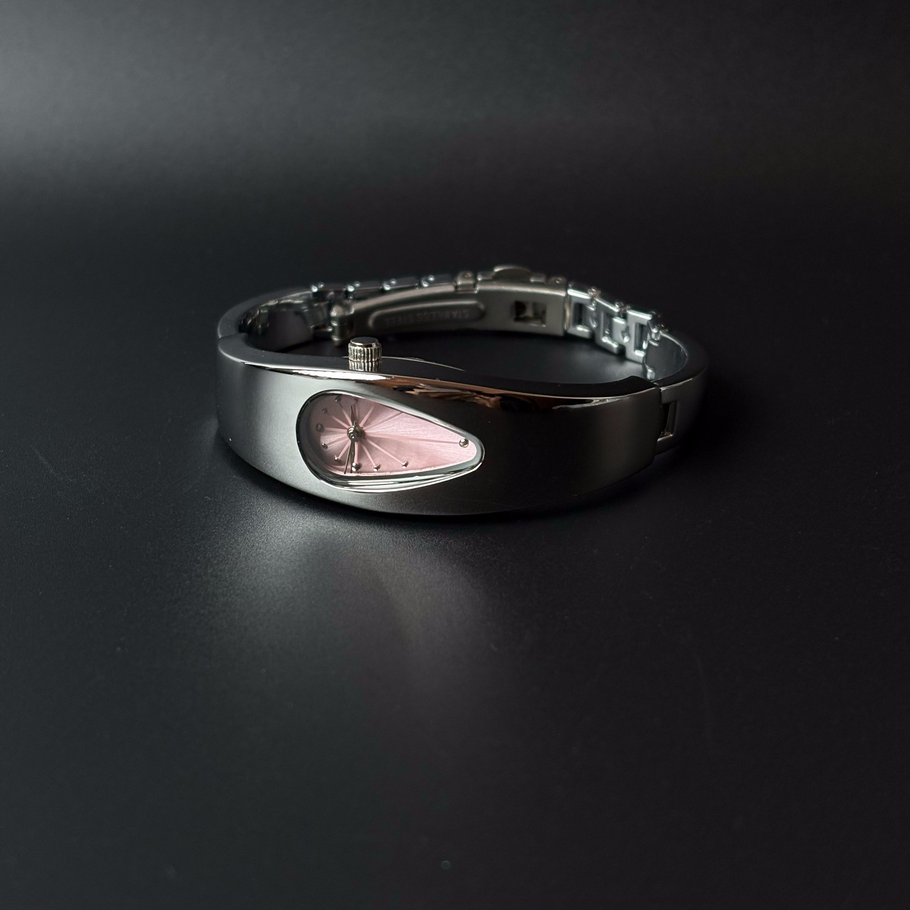 Mercury Drop pink dial Y2K futuristic waterdrop watch angled view