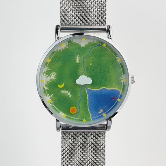 Nature's Orbit watch video demonstrating the Sun hour indicator and Moon minute indicator orbiting the landscape dial