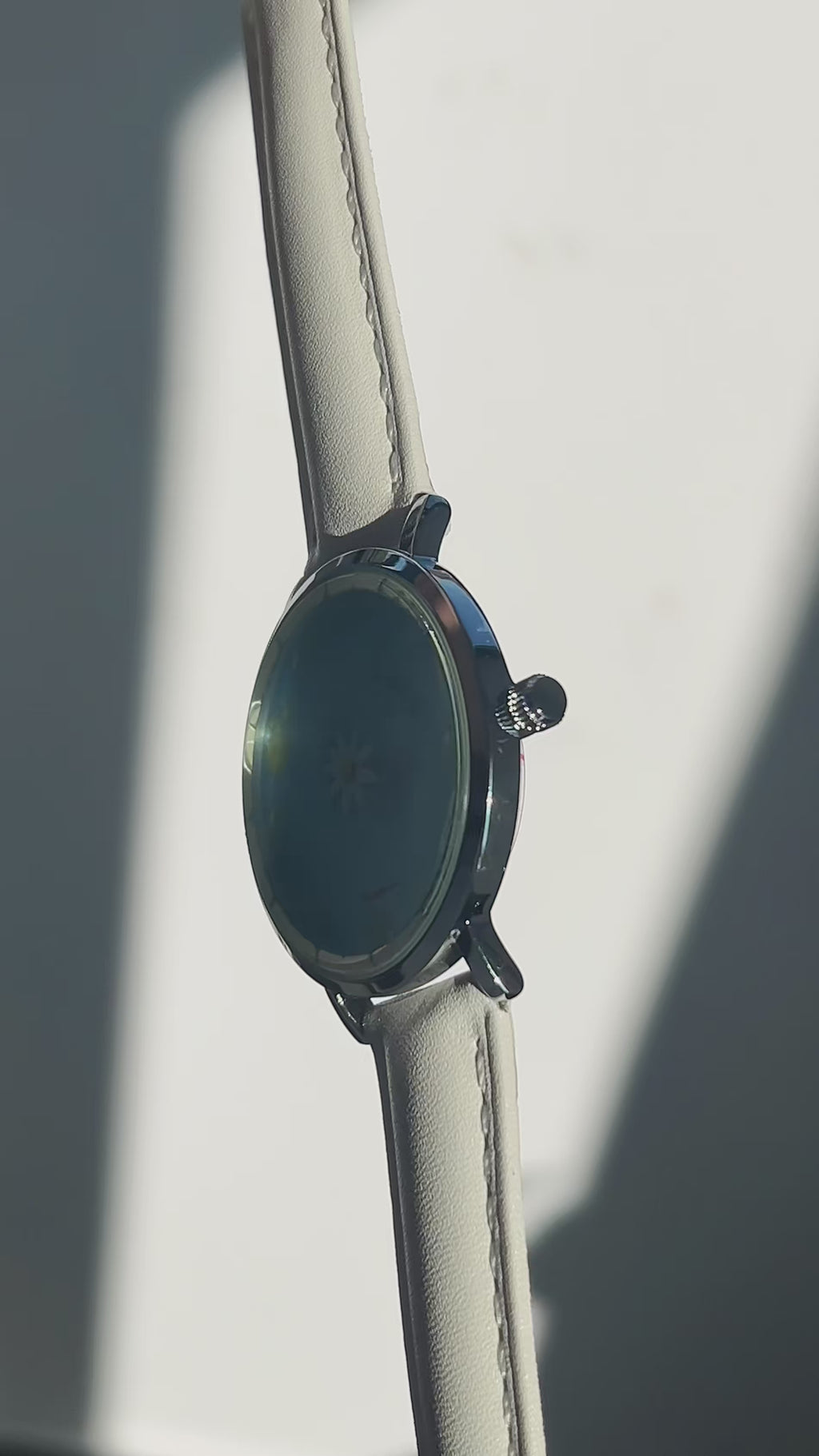 Aqua Animism watch video showing the blue lotus dial and circling koi hour and minute indicators