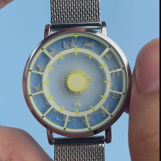 Astral Mythos watch video demonstrating the Sun ray hour indicator and crescent Moon minute indicator