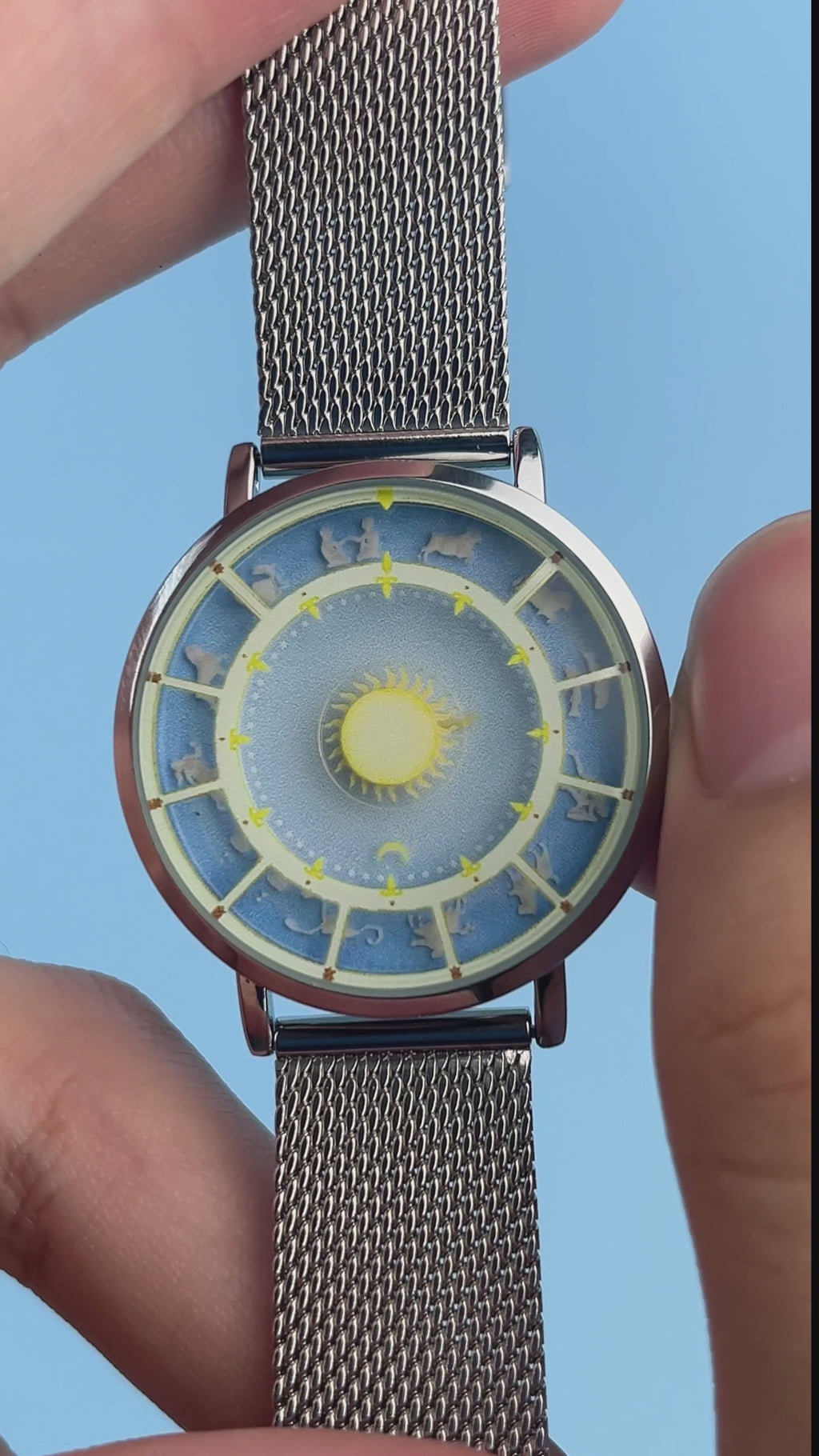 Astral Mythos watch video demonstrating the Sun ray hour indicator and crescent Moon minute indicator