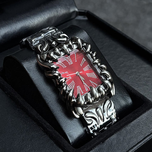 Abyss Grip red dial gothic skeleton claw watch presented in box